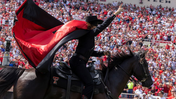 masked rider on football field