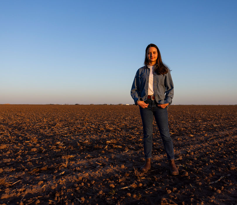 girl standing in field