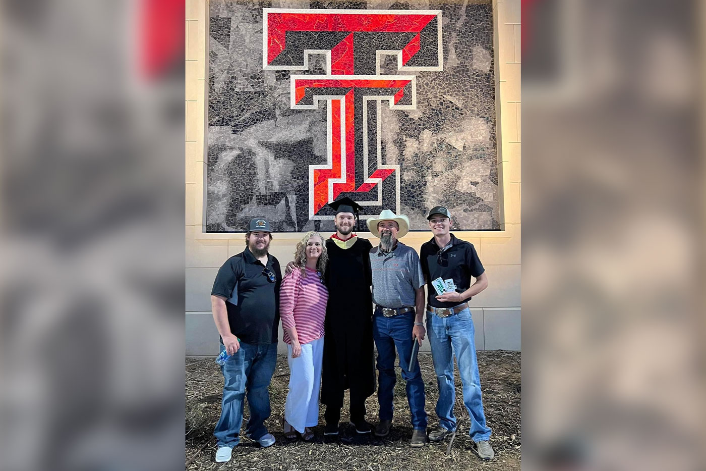 The Holtman family, (from left): Jagger, Cheryl, Nathan, Joe Wayne, and Jake at Nathan's first master’s commencement in May 2022.