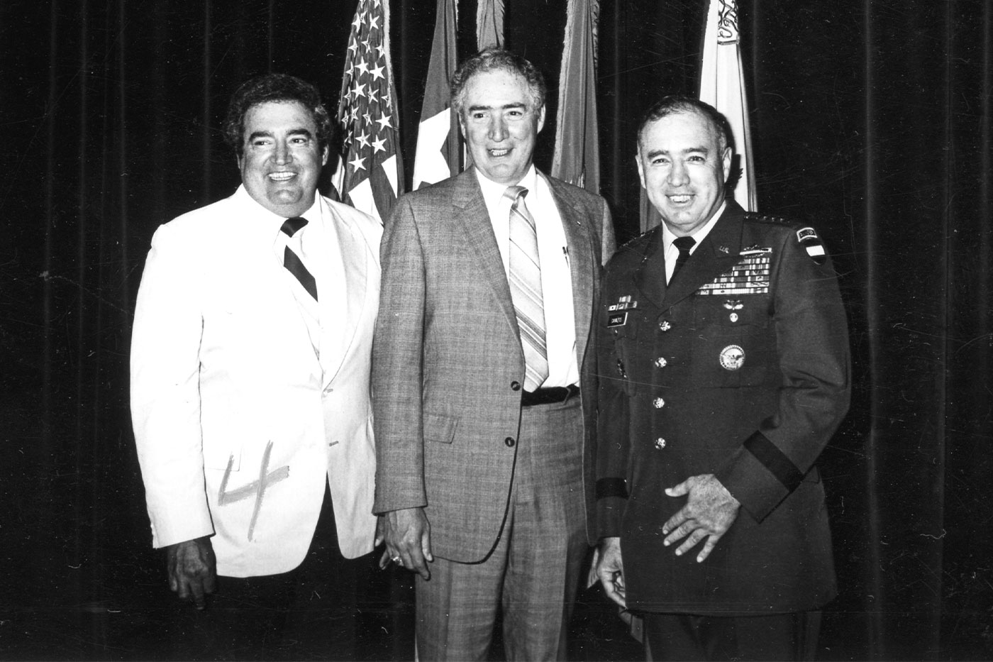 Bobby, Lauro and Dick pose at the 1982 commencement ceremony. 