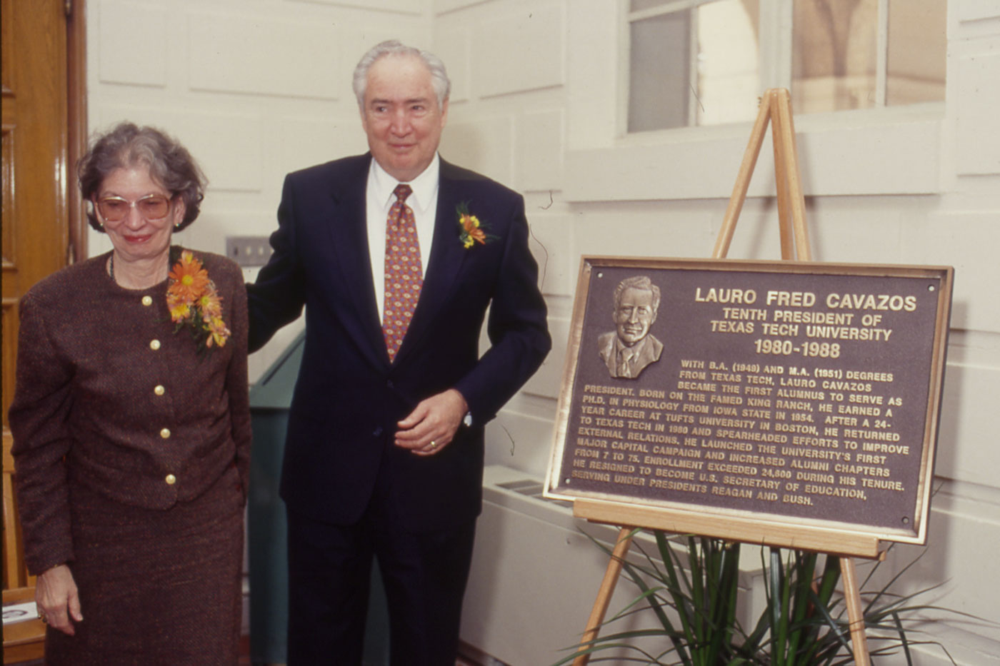 Peggy and Lauro at his presidential plaque presentation ceremony in the stairwell of the Administration Building.  