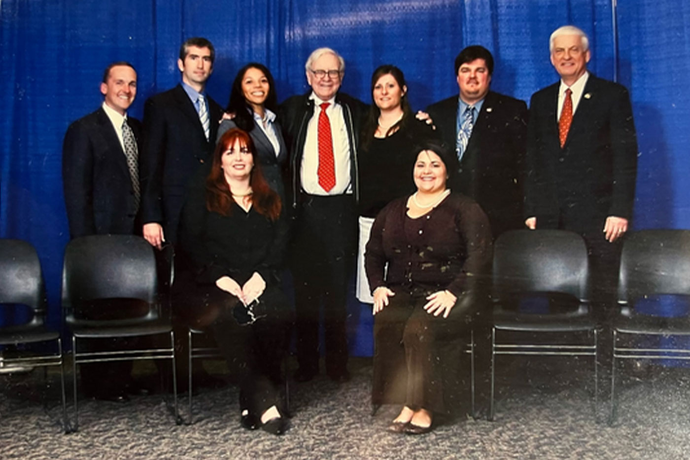 Victoria with her GEICO division and Warren Buffett