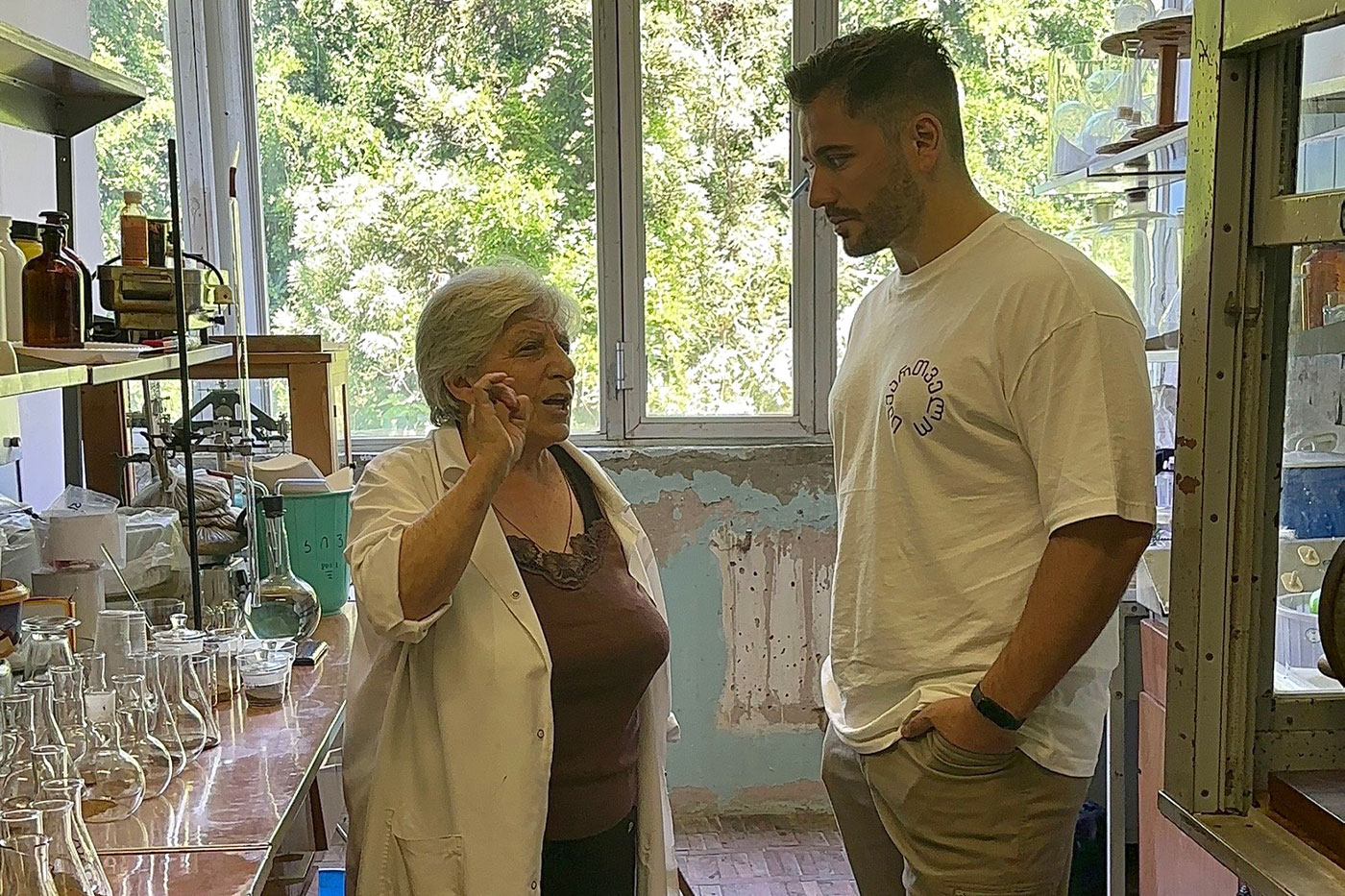 Devi (right) with a tea scientist at Georgia’s Institute of Tea, Subtropical Crops and Tea Industry in Anaseuli.