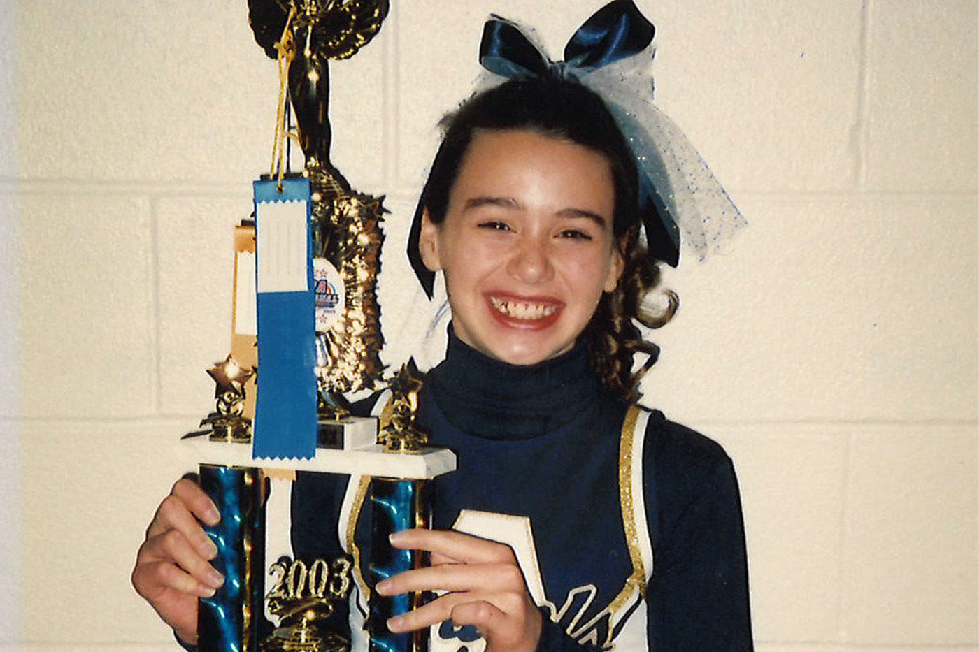 Megan Sprague holding a trophy