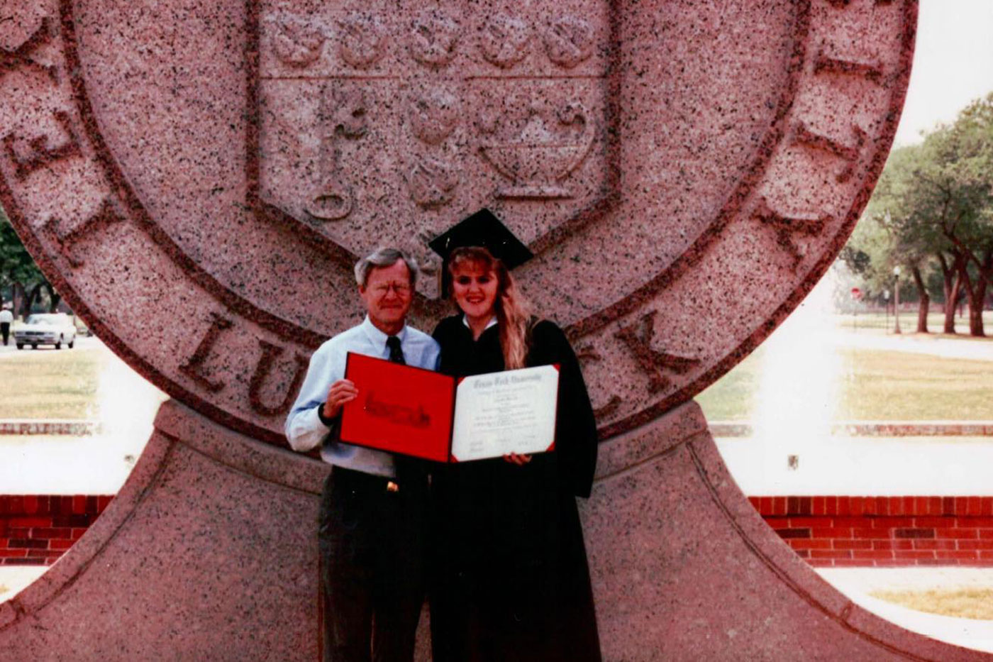 With dad at graduation