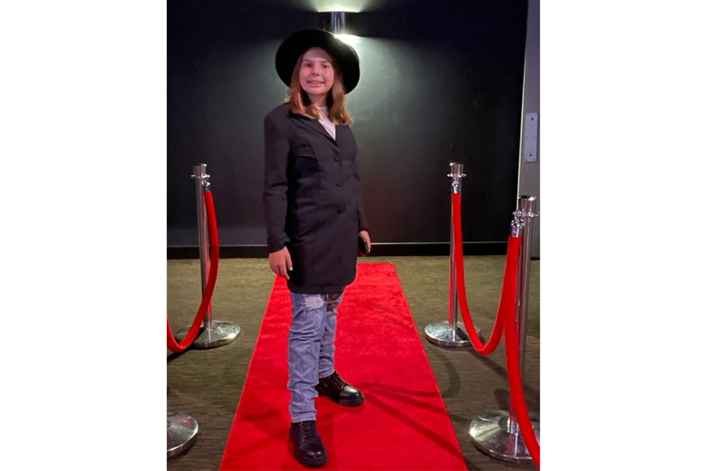 Daynne poses at the red-carpet premiere of her short film “Final Signoff,” created by her at the Movie Institute in Frisco, Texas. 