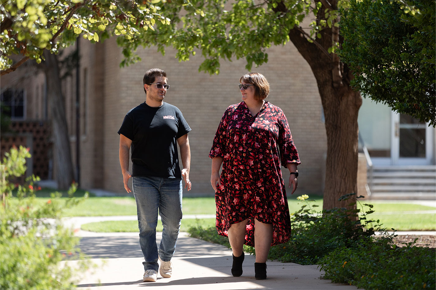 Rachel Hoover walking with a student