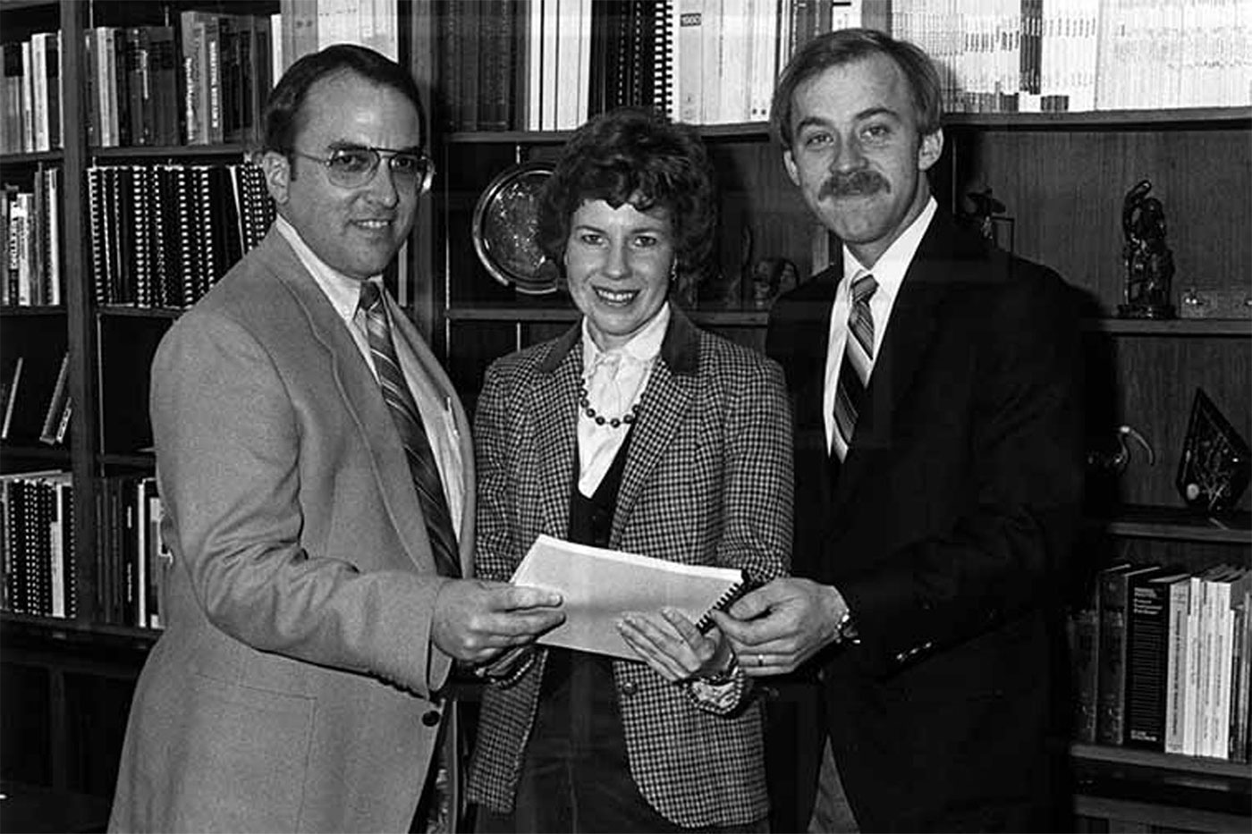 From left, John R. Darling, vice president of academic affairs; Haley, dean of home economics; and David Hayes, program director, discuss plans for the university's new program in Restaurant, Hotel & Institutional Management. Image courtesy of the Southwest Collection/Special Collections Library.