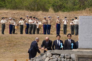Japanese dignitaries conduct a sand ceremony during the Iwo Jima 70th anniversary celebration.